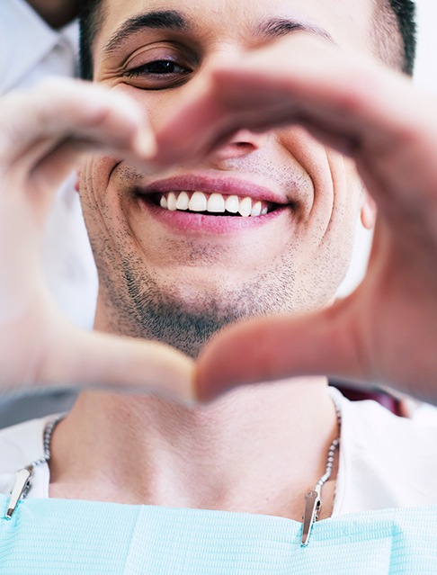 The benefits of gum recontouring include a bolder smile and a lower risk of gum disease.