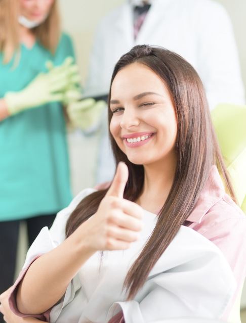 Patient in Tucson smiling after getting dental implants