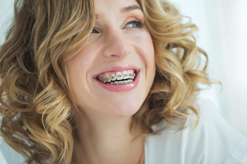 Lady with braces has pretty smile